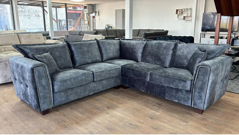 Serena Velvet Effect Fabric Large Corner Sofa Metal Trim Arms